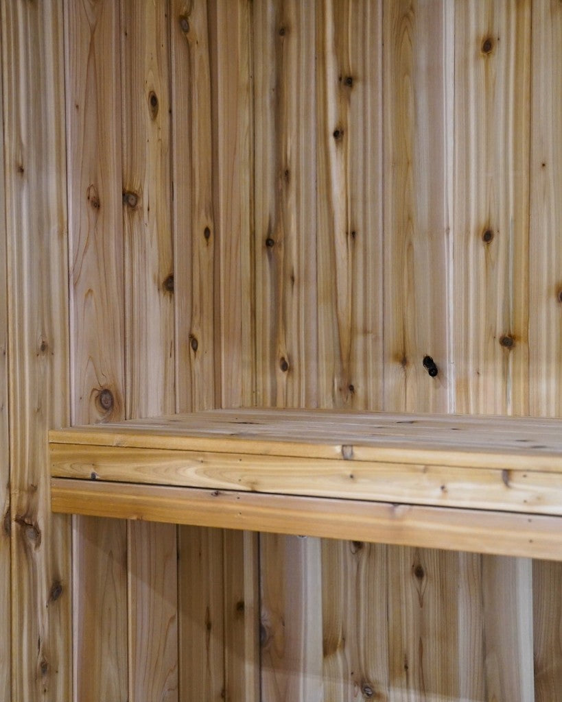 Custom lower bench against knotty cedar walls